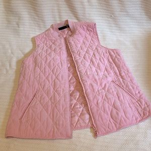 This is a small pink vest prefect for summer or under a cute long sleeve!
